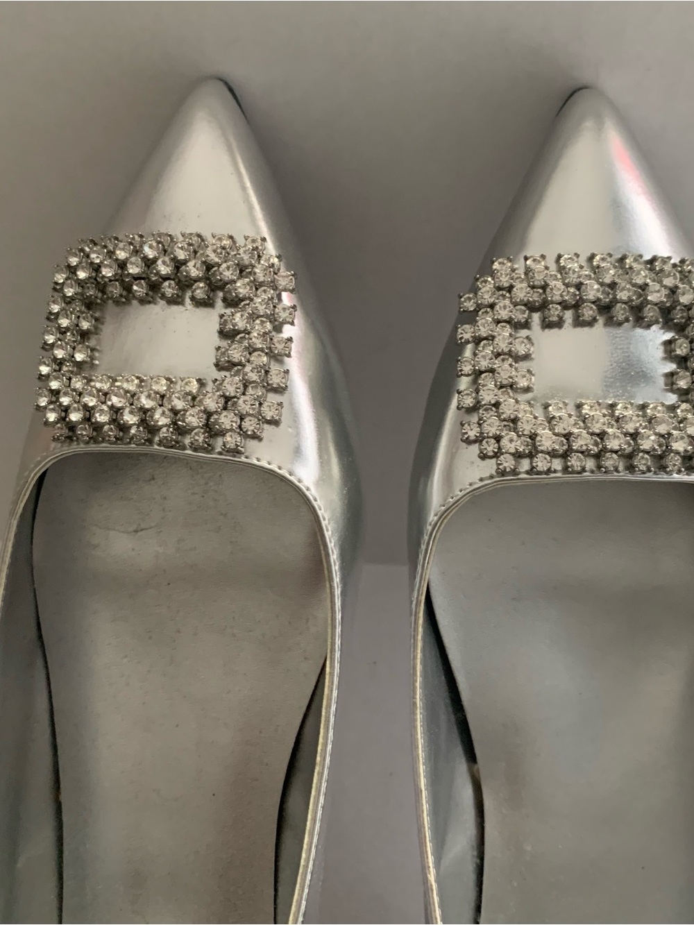 Nine West Silver Pointed-Toe Flats with Crystal Buckle Embellishment